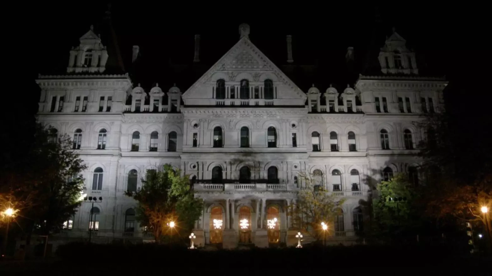 The New York state Capitol building at night.